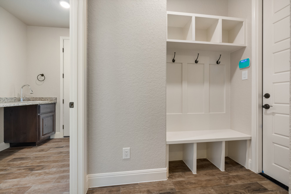 Entryway - rustic entryway idea in Austin
