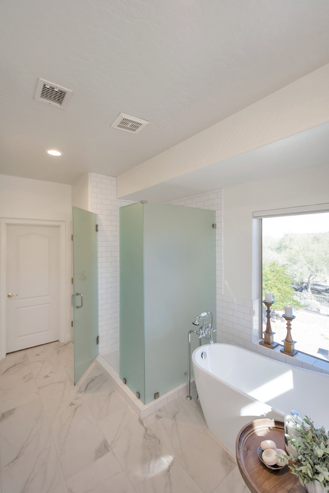 Mid-sized transitional master white tile and subway tile porcelain tile and white floor freestanding bathtub photo in Phoenix with a hinged shower door