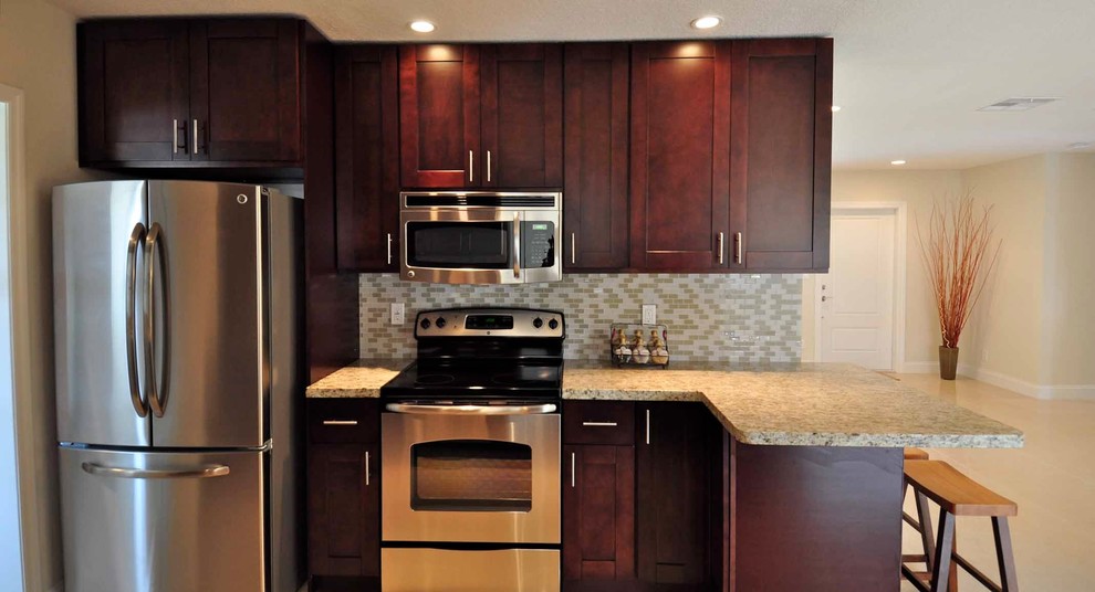 Example of a transitional kitchen design in Miami