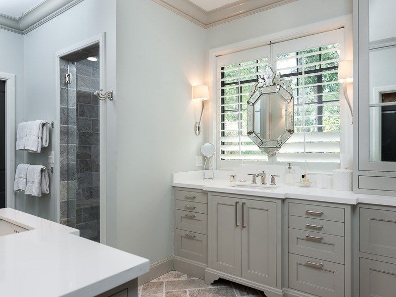 Design ideas for a mid-sized transitional master bathroom in Los Angeles with shaker cabinets, grey cabinets, an alcove shower, blue walls, plywood floors, an undermount sink, quartzite benchtops, brown floor and a hinged shower door.