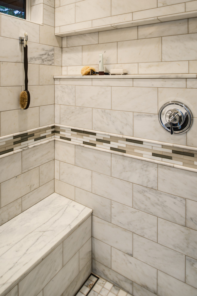 This is an example of a mid-sized transitional master bathroom in San Francisco with an undermount sink, furniture-like cabinets, dark wood cabinets, marble benchtops, a double shower, a two-piece toilet, white tile, stone tile, grey walls, marble floors and a sliding shower screen.
