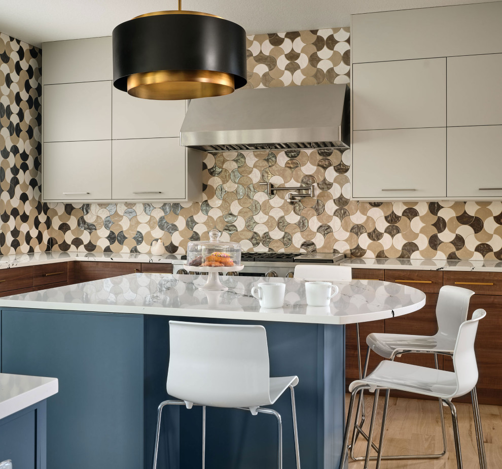 Mid-sized mid-century modern l-shaped kitchen photo in Denver with an undermount sink, flat-panel cabinets, quartz countertops, ceramic backsplash, paneled appliances and two islands