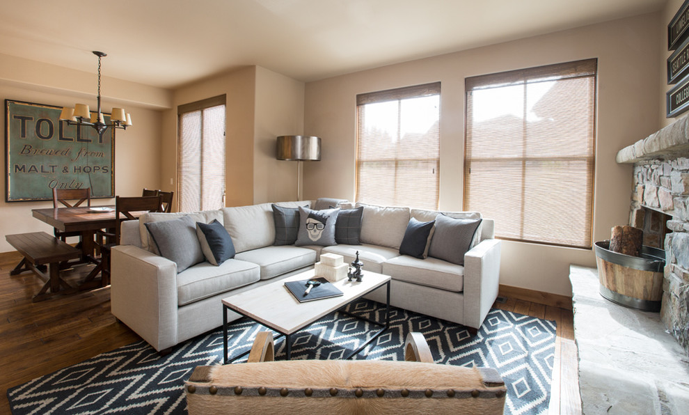 This is an example of a transitional living room in Boise with beige walls.