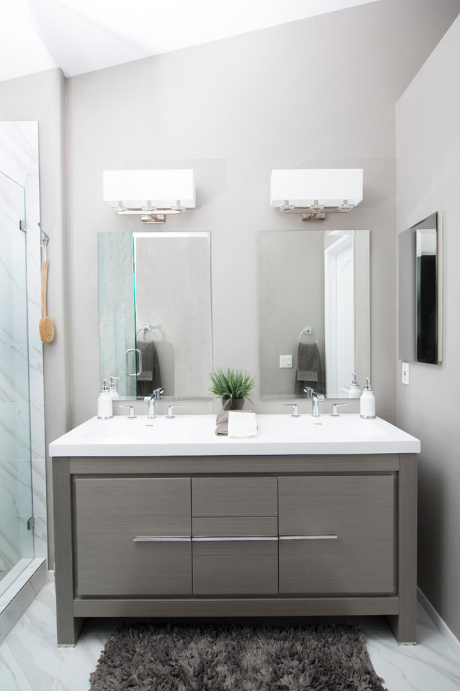 Design ideas for a mid-sized contemporary 3/4 bathroom in San Diego with flat-panel cabinets, grey cabinets, gray tile, white tile, stone slab, grey walls, an undermount sink, an alcove shower, marble floors and engineered quartz benchtops.