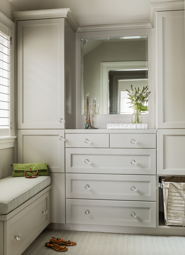 Inspiration for a beach style storage and wardrobe in Boston with recessed-panel cabinets and grey cabinets.