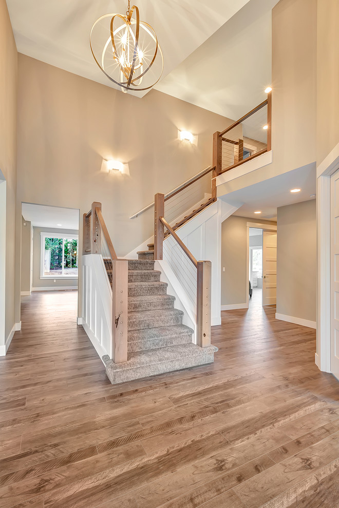 Example of a transitional foyer design in Seattle