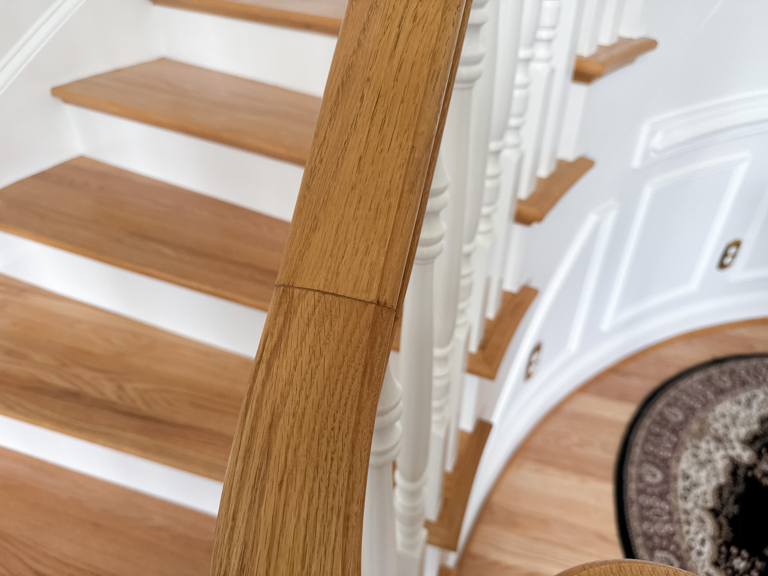 Project #161 | Curved Red Oak Foyer Staircase, 26 Years Later