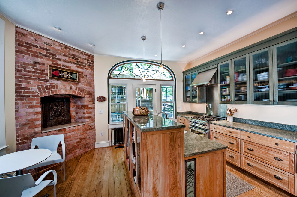 Inspiration for a mid-sized transitional medium tone wood floor eat-in kitchen remodel in DC Metro with medium tone wood cabinets, granite countertops and an island