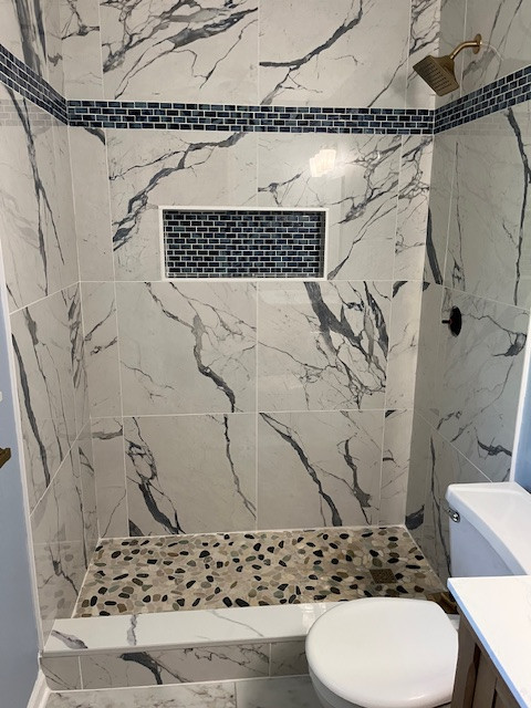 Bathroom with full tile shower