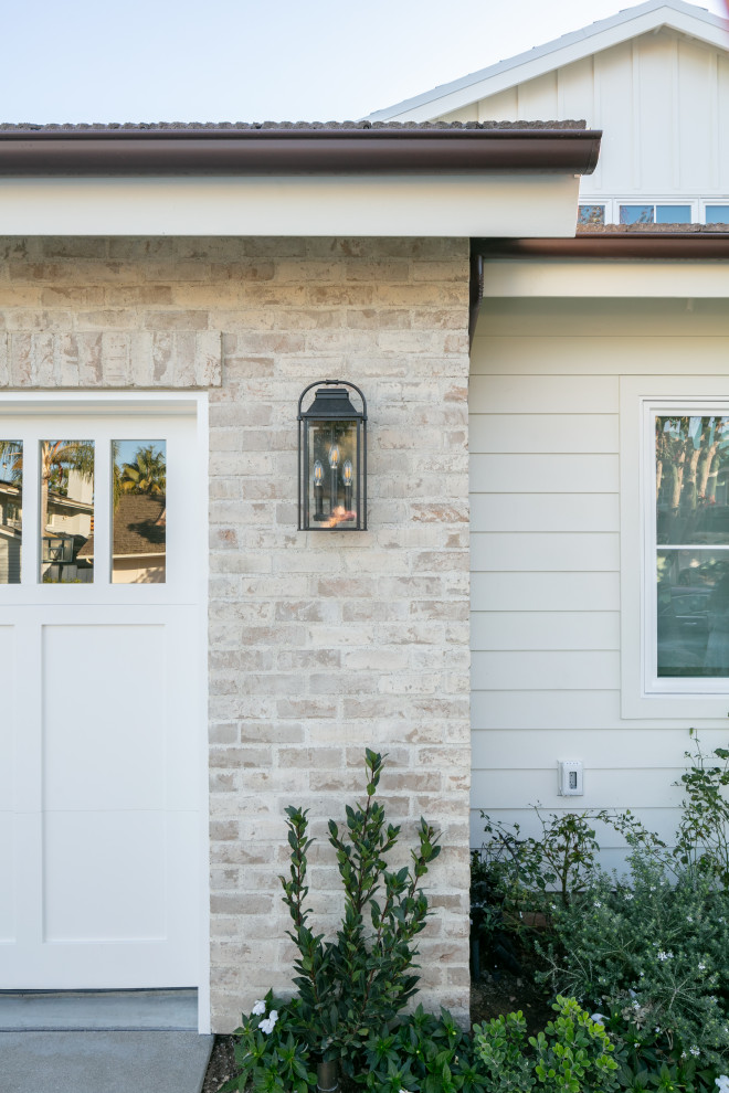 Inspiration for a coastal garage remodel in Orange County