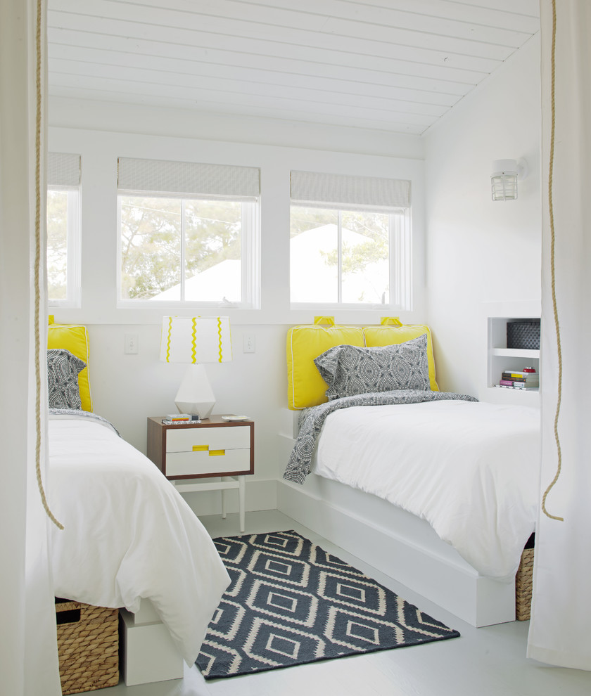 Inspiration for a small transitional guest bedroom in Atlanta with white walls and painted wood floors.