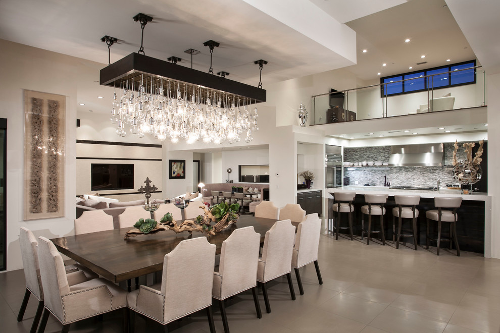 Design ideas for an expansive modern open plan dining in Orange County with porcelain floors.