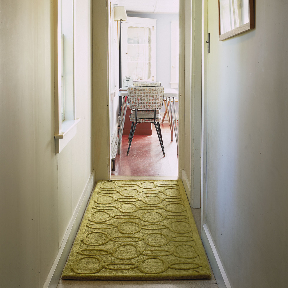 This is an example of a contemporary hallway in Portland Maine with white walls.