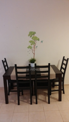 Mid-sized trendy dining room photo with white walls