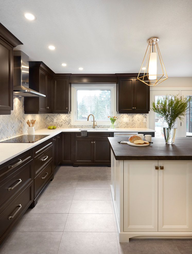 Example of a transitional kitchen design in Toronto