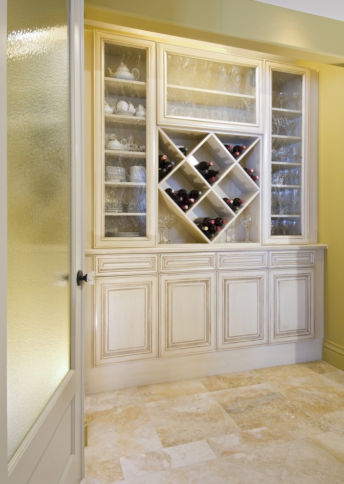 Inspiration for a mid-sized transitional wine cellar in Toronto with diamond bins and brown floor.