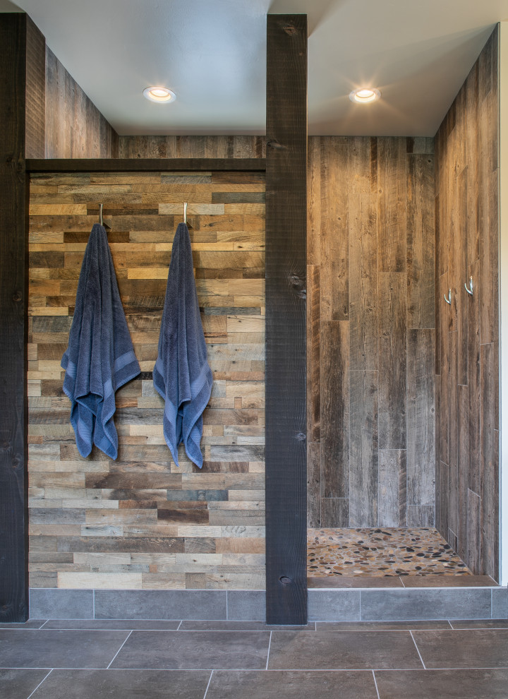 Photo of a mid-sized country master bathroom in Seattle with an open shower, multi-coloured tile, ceramic tile, beige walls, ceramic floors, grey floor, an open shower and wood walls.