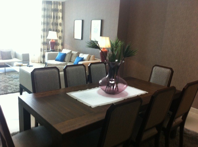 Inspiration for a small contemporary dining room in Other with brown walls.