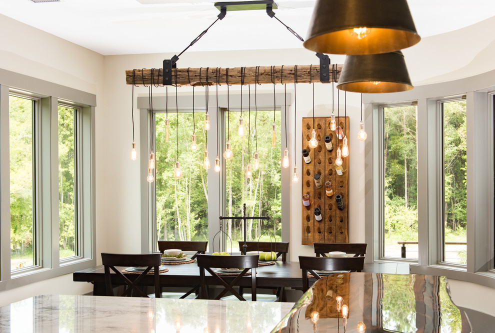 Kitchen/dining room combo - mid-sized rustic dark wood floor and brown floor kitchen/dining room combo idea in Charleston with beige walls and no fireplace
