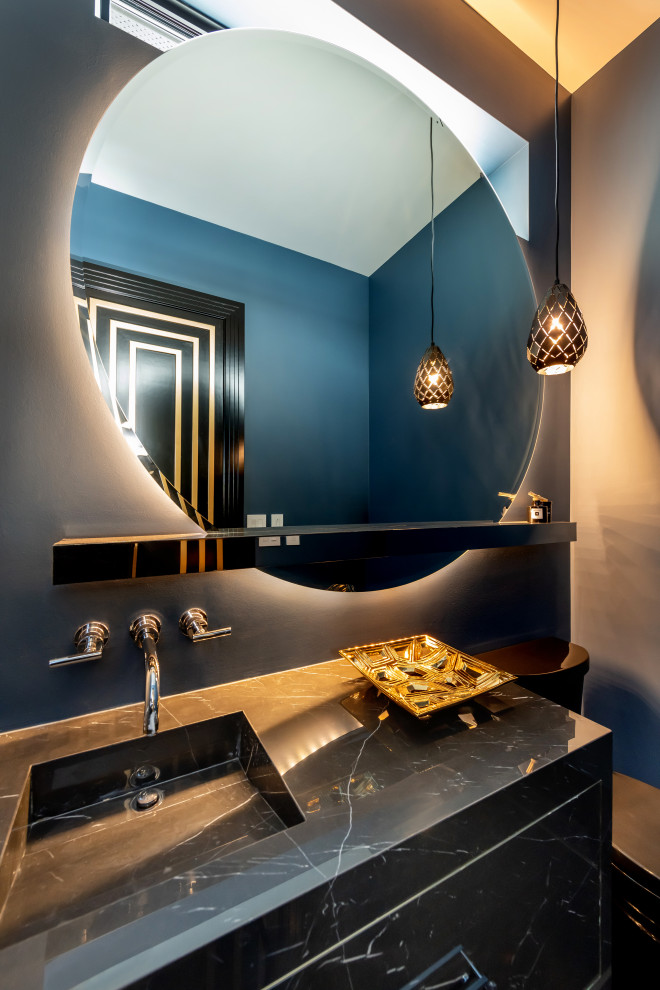 Photo of an expansive contemporary cloakroom in Other with open cabinets, black cabinets, a wall mounted toilet, black walls, a built-in sink, marble worktops, black worktops and a built in vanity unit.