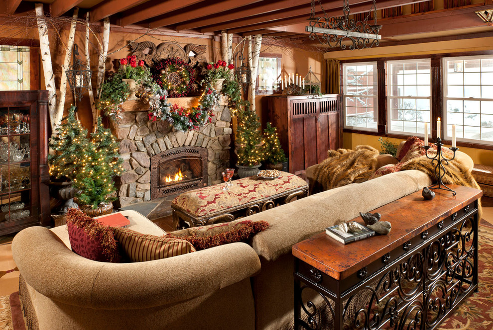 Inspiration for a country living room in Other with a standard fireplace and a stone fireplace surround.