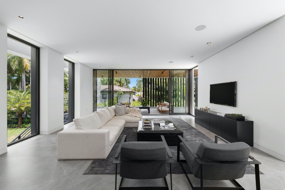 Photo of a modern family room in Miami.