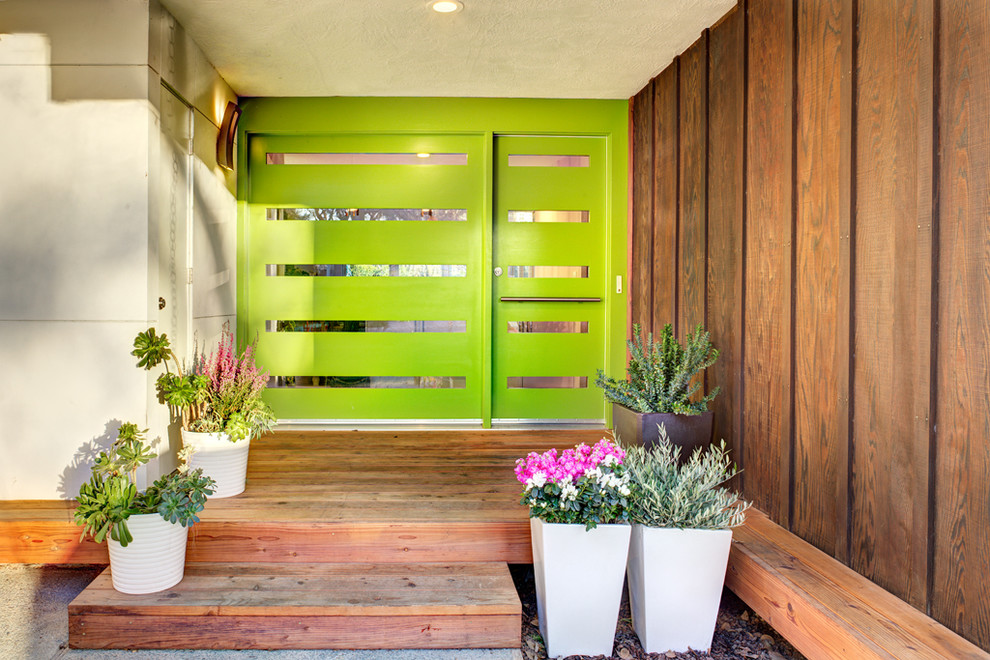 Mid-sized midcentury front door in Sacramento with a single front door and a green front door.