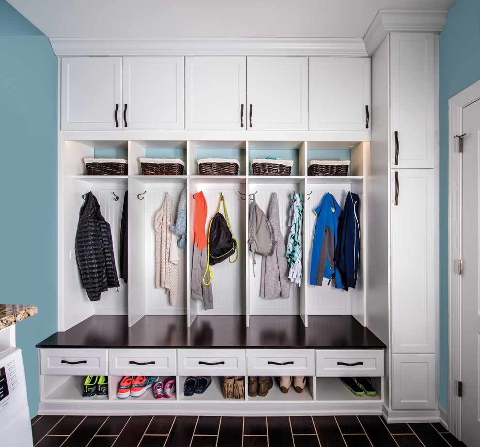 Example of a small transitional ceramic tile entryway design in Chicago with blue walls and a white front door
