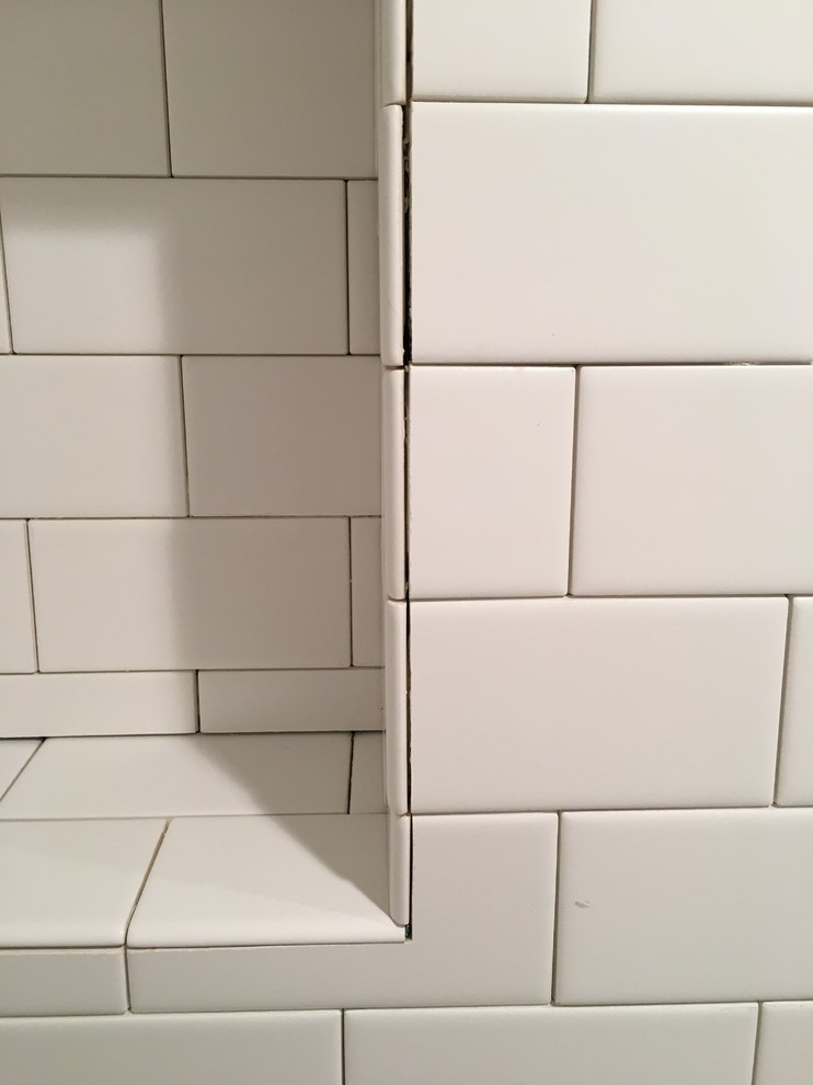 Poorly cut & laid tile.
