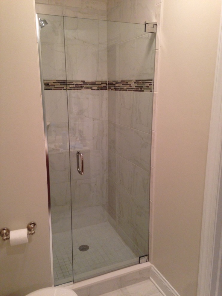 Photo of a transitional 3/4 bathroom in Other with an alcove shower, beige tile, ceramic tile, beige walls, ceramic floors, beige floor and a hinged shower door.