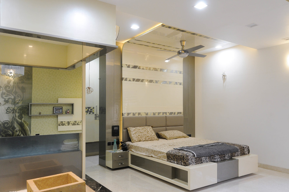 Design ideas for a contemporary bedroom in Hyderabad.