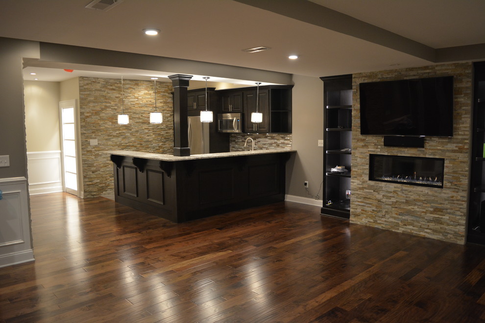 Transitional brown floor basement photo in Philadelphia