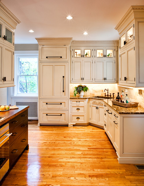 White Kitchen Renovation with Detailed Moldings and Trims ...