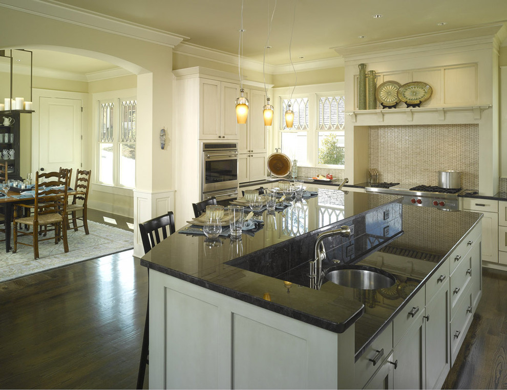 Traditional kitchen in Atlanta with white cabinets.