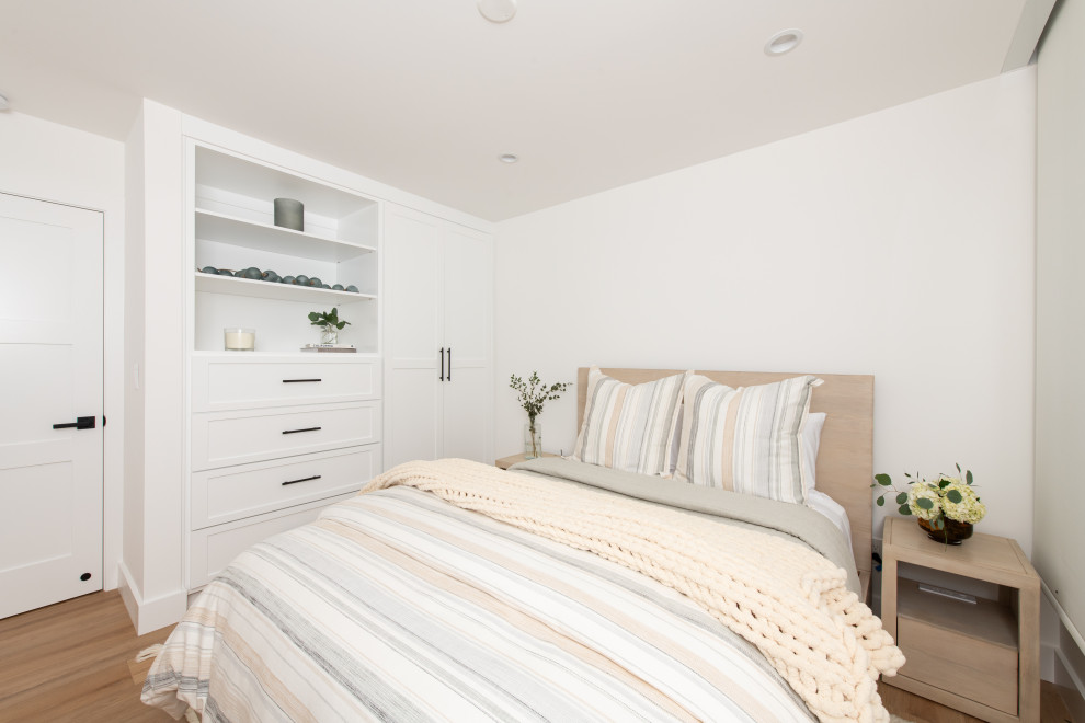 Photo of a coastal bedroom in Orange County.