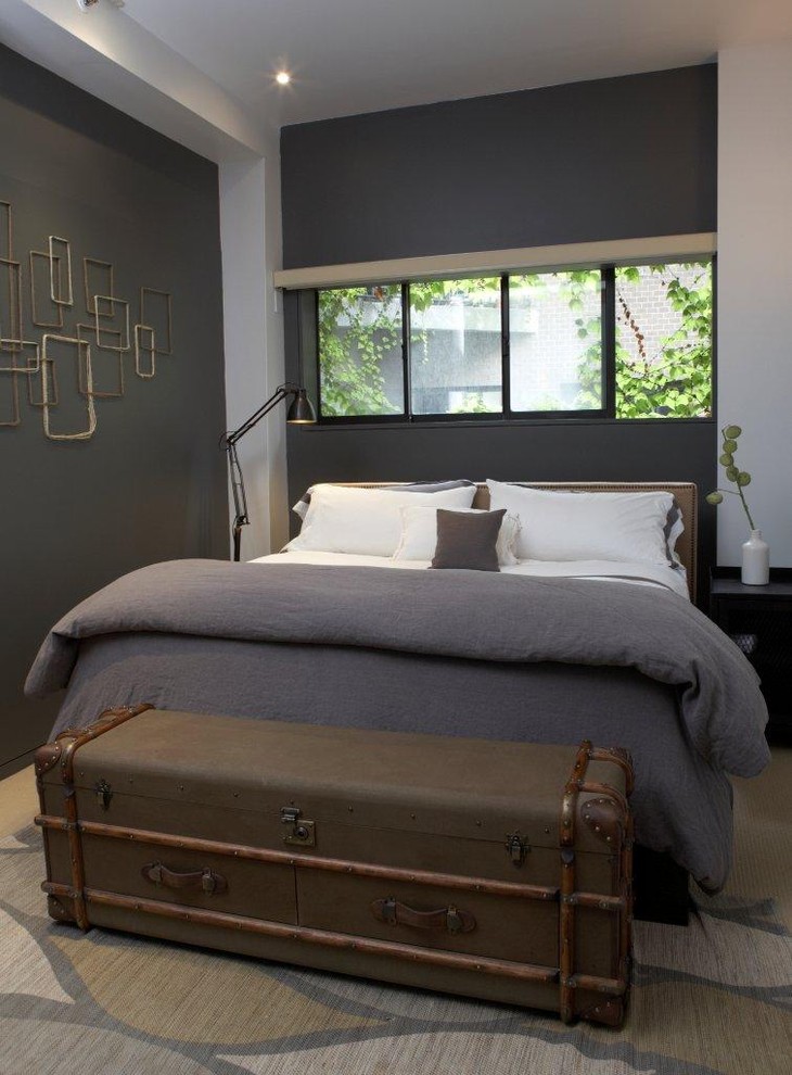 Design ideas for an eclectic bedroom in New York with grey walls.