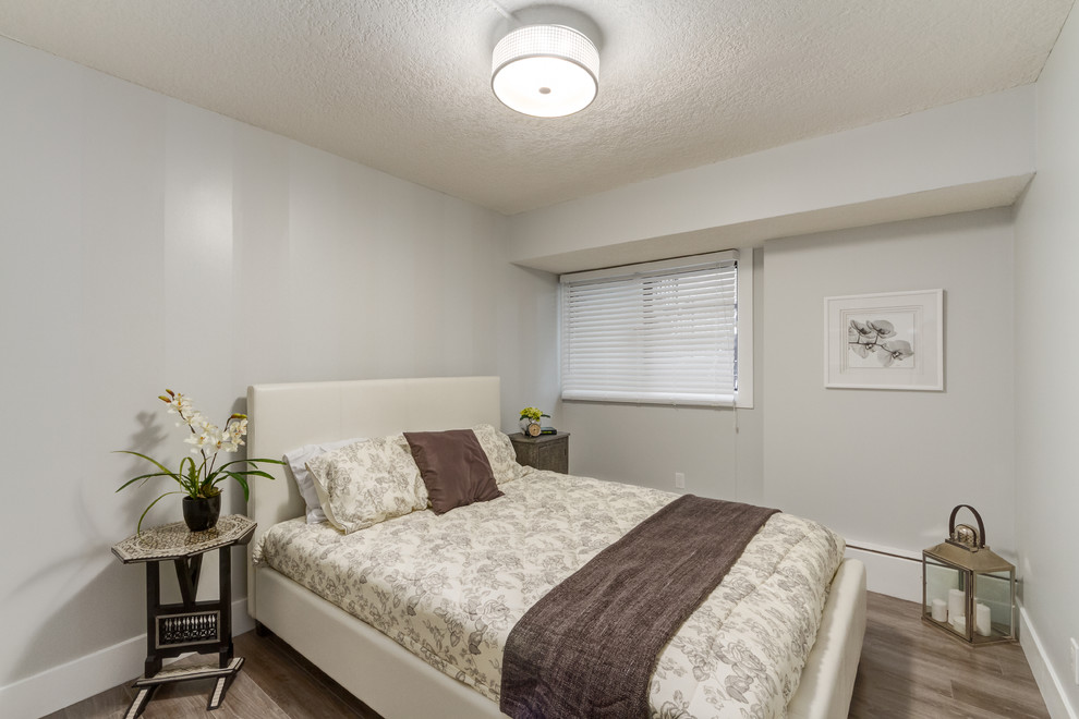 Photo of a modern bedroom in Calgary.