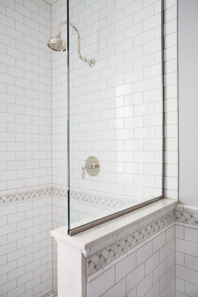 This is an example of a mid-sized traditional master bathroom in Chicago with shaker cabinets, grey cabinets, a freestanding tub, an open shower, a one-piece toilet, white tile, cement tile, grey walls, mosaic tile floors, a drop-in sink, quartzite benchtops, white floor, an open shower, white benchtops, a single vanity and a built-in vanity.