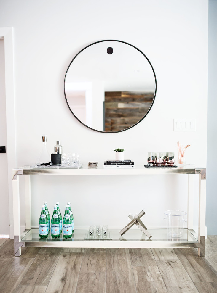 Mid-sized transitional porcelain tile and gray floor hallway photo in Phoenix with white walls