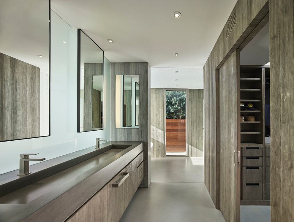 Design ideas for a mid-sized midcentury master bathroom in Los Angeles with light wood cabinets, brown walls, concrete floors, concrete benchtops, grey benchtops, flat-panel cabinets, a trough sink and grey floor.