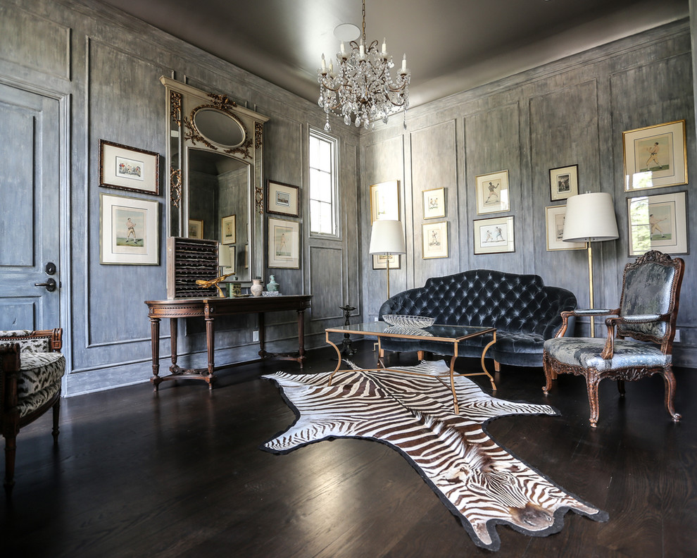 Photo of a mid-sized traditional formal enclosed living room in Houston with grey walls, dark hardwood floors, no fireplace and no tv.