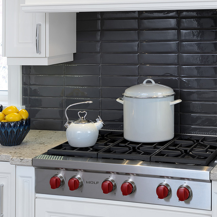 Eat-in kitchen - mid-sized transitional l-shaped vinyl floor eat-in kitchen idea in Toronto with a double-bowl sink, recessed-panel cabinets, white cabinets, granite countertops, gray backsplash, porcelain backsplash, stainless steel appliances and an island