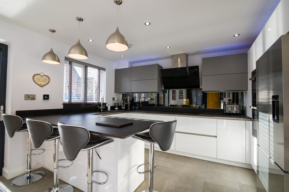 Design ideas for a medium sized modern kitchen in Manchester.