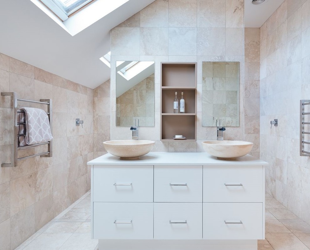 Photo of a large transitional master bathroom in Sydney with flat-panel cabinets, white cabinets, an alcove shower, a wall-mount toilet, beige tile, travertine, beige walls, limestone floors, a vessel sink, engineered quartz benchtops, beige floor, an open shower and white benchtops.