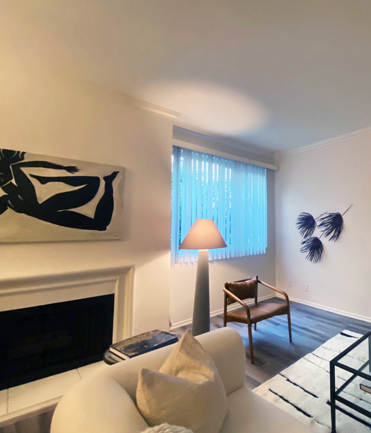 By selecting mostly warm whites, charcoals and natural wood tones we introduced a warm, inviting vibe.
