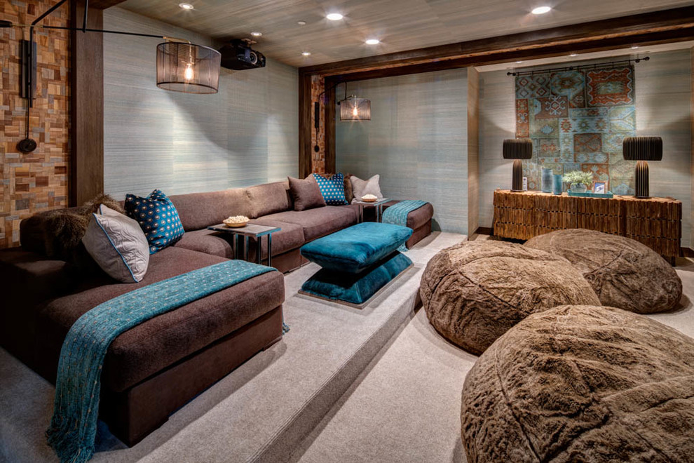 This is an example of a large contemporary enclosed home theatre in Salt Lake City with blue walls, carpet and beige floor.