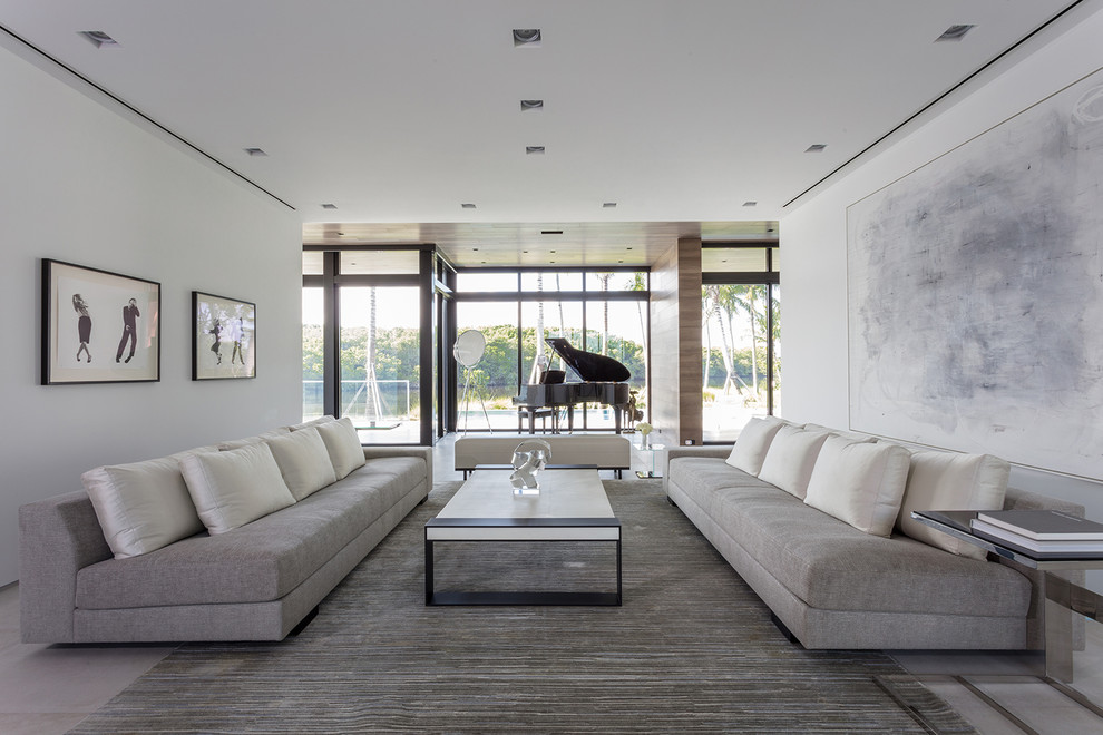 Modern open concept living room in Miami with a music area, white walls and no fireplace.