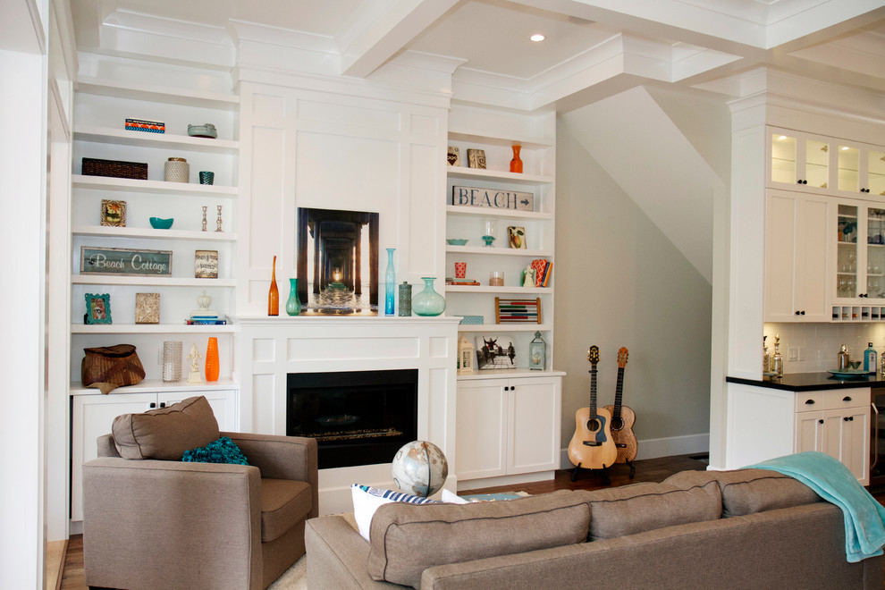 This is an example of a beach style living room in Vancouver with white walls.