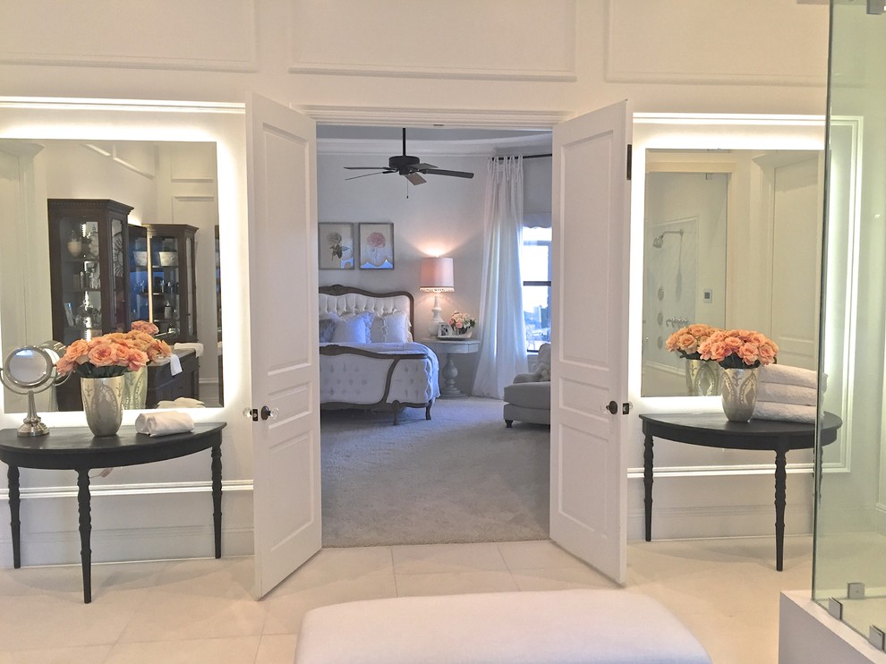 Huge transitional master limestone floor freestanding bathtub photo in Phoenix with white walls