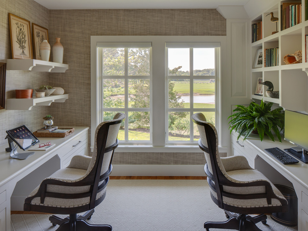 This is an example of a beach style home office in Boston.